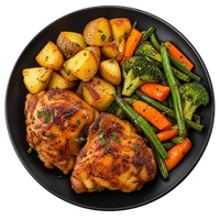 Hauts de cuisse de poulet au paprika fumé, pommes de terre rôties et légumes